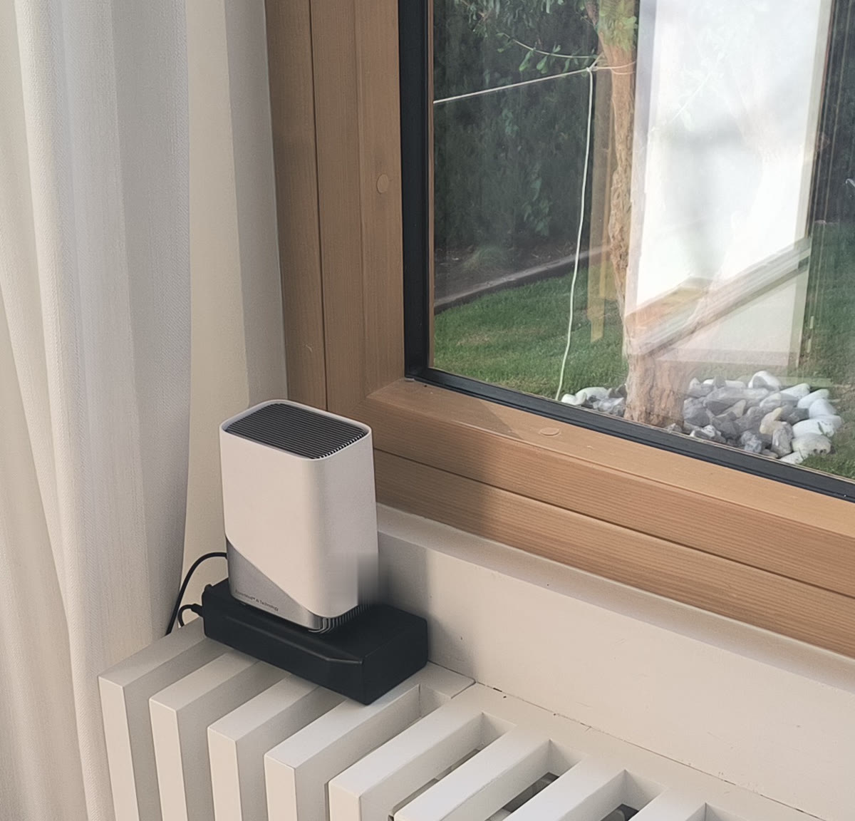 The camera hub, installed inside the home